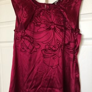 Red silk blouse